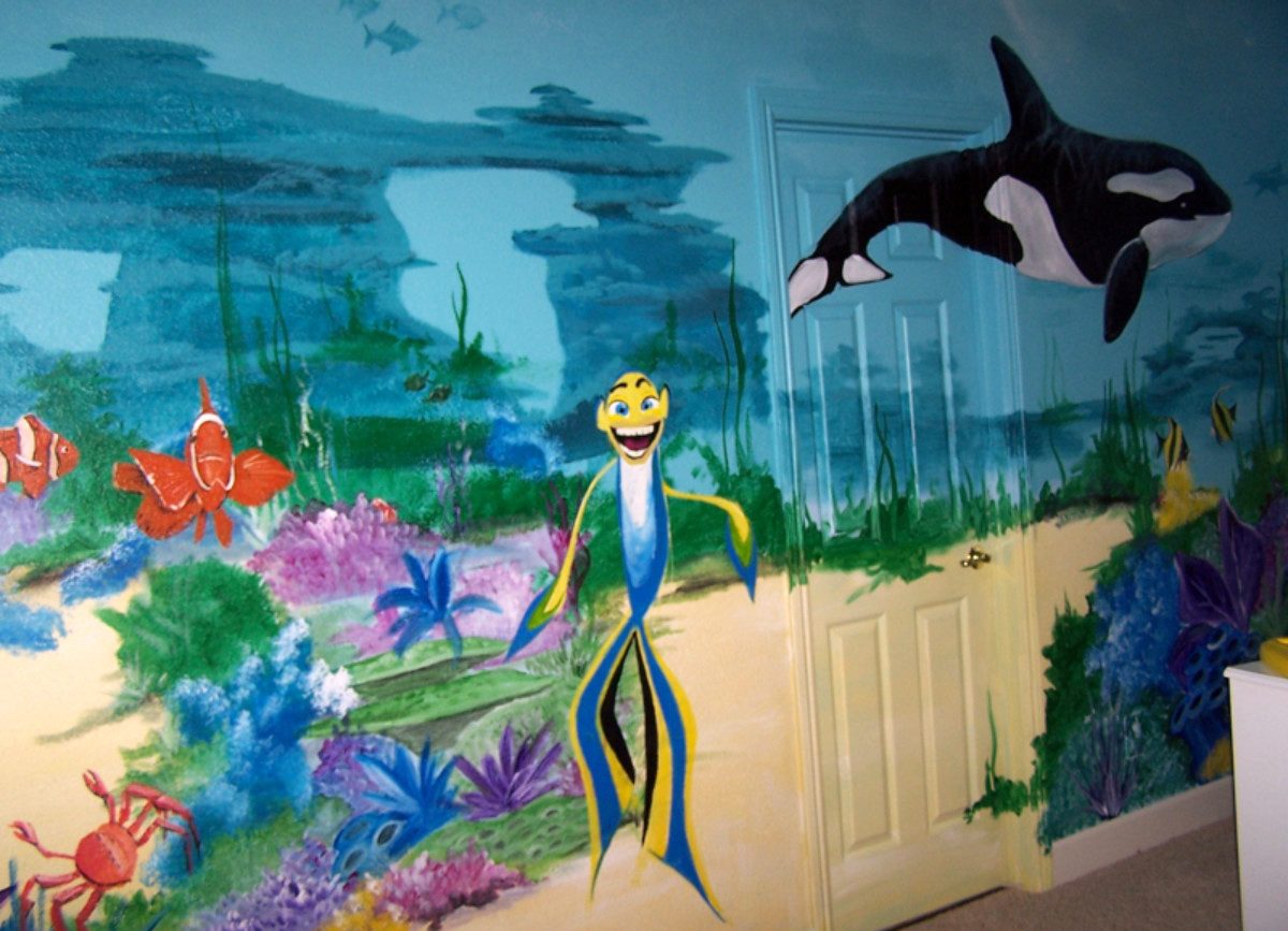 Underwater scene with a killer whale and other sea creatures in a children's room