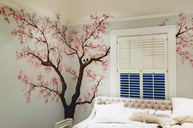 Cherry blossom tree mural in a child's room