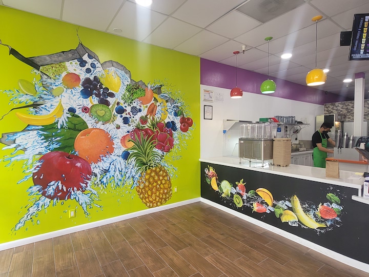 Trompe l’oeil mural for Fresh Fuel juicery in Hayward, CA. With strawberries, pineapples, blueberries, kiwi, and more.