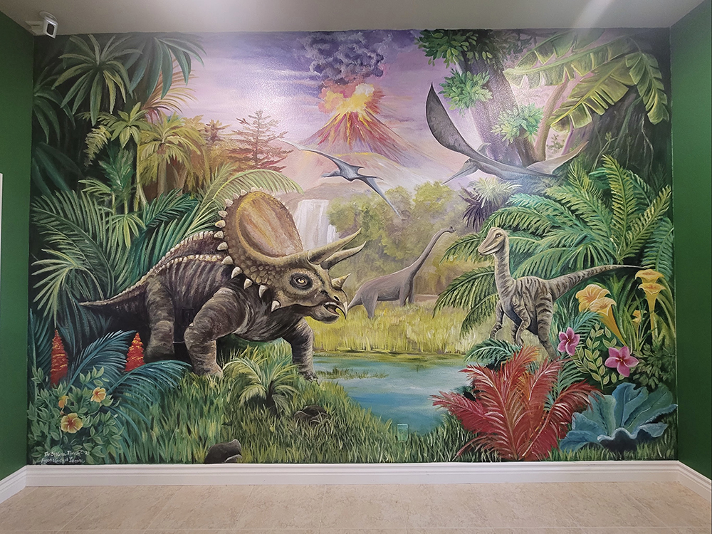 Mural of dinosaurs in a children's playroom
